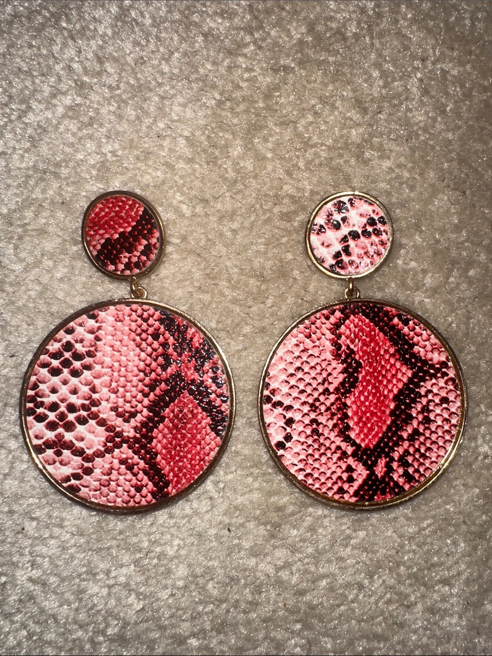 Snakeskin print circular statement earrings
